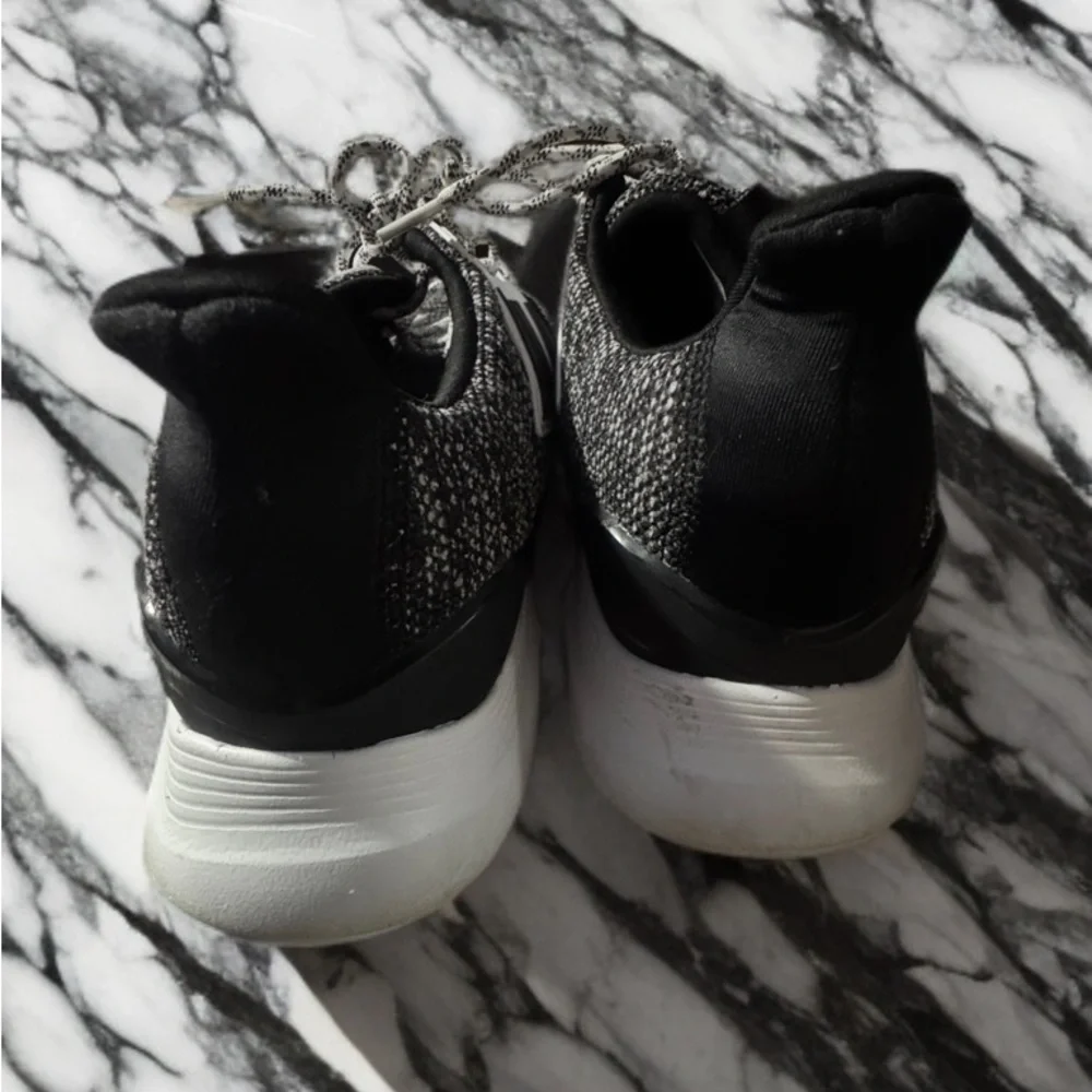 Adidas Black and White Sneakers with Sleek Design